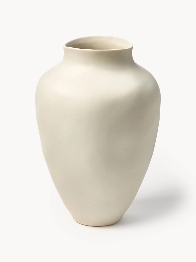 Vase blanc et objet